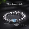 Elegante bracciale di perle in cristallo bianco con una perla centrale in acquamarina - Bracciale Cristallo Acquamarina 8mm / Diametro perla 8mm
