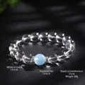 Elegante bracciale in cristallo bianco con una pietra centrale di acquamarina 12mm - Bracciale Cristallo Acquamarina 10mm / Diametro della perla 10mm