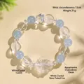 Elegant white crystal nine-tailed fox bracelet featuring light blue aquamarine chalcedony beads - Aquamarine Chalcedony & White Crystal