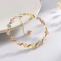 Elegante pulsera artesanal de cuentas de cuarzo rutilado colorido con tejido de hilo dorado - Estilo Trenzado de Cobre Chapado en Oro