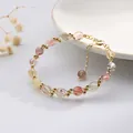 Pulsera artesanal de cristal de cuarzo rutilado natural con alambre dorado - Estilo Trenzado con Chapado de Retención de Color