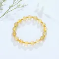 Elegant handgemaakte kristallen kralenarmband met gouden kralen en rutilkwarts - Rutilkwarts Gouden Kraal Stijl