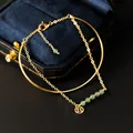 Elegant gold-plated chain bracelet with green natural crystals and lucky coin charm - Green Aventurine