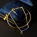 Elegant gold-plated chain bracelet and bangle set featuring natural blue lapis lazuli beads - Lapis Lazuli