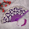 Traditional Chinese style purple folding fan with white floral embroidery and tassel detail. - Purple Cherry Blossom Fans with Large Tassels