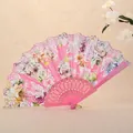Elegant pink folding fan featuring rose floral patterns and delicate lace edges for dancing. - Pink