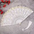 Traditional Chinese folding fan with gold floral embroidery, white tassel and jade pendant for Hanfu. - White Cherry Blossom Fans with Large Tassels