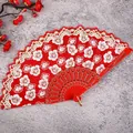 Chinese traditional red folding fan with floral lace trim, perfect for Hanfu and dance performance. - Bright Red Cherry Blossom Fans