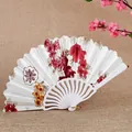 Elegant Chinese style folding fan with red floral pattern and white plastic frame - Red White