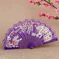 Elegant purple Chinese style folding fan featuring white peacock and floral embroidery design - Purple