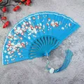 Elegant blue folding fan with white plum blossoms and decorative tassel for dancing - Sky Blue