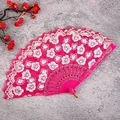 Pink folding fan with white floral patterns, traditional Chinese style dance prop for women. - Cherry Blossom Rose Red