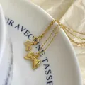 Minimalistische goldene Schleifen-Halskette aus S925 Sterlingsilber für Damen Accessoires - Goldene 3D-Schleife (XL2644)