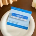 Blue acrylic road sign refrigerator magnet with motivational Chinese text 70x20mm - Love Money and Self / 70x20mm