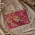 Vintage wine red envelope featuring gold foil marble pattern and a bronze wax seal - 酒红色信封+火漆贴