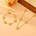 Elegant gold stainless steel jewelry set featuring daisy flower charms necklace and bracelet - Daisy Set (Bracelet + Necklace) / Gold
