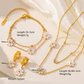 Detailweergave van gouden madeliefje ketting en armband set met afmetingen en gewichten. - Oorbellen Armband Ketting Set / Gouden Madeliefje Volledige Set