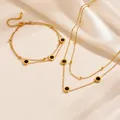 Detailweergave van de gouden roestvrijstalen ketting en armband set met Romeinse cijfers - Zwarte Schelp Dubbellaagse Romeinse Set (I206+N103) / Ketting & Armband Set