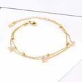 Gedetailleerde weergave van een dubbellaagse 18K goud roestvrijstalen sterrenarmband. - Ster Enkelbandje (P402)