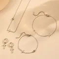 Macro view of titanium steel jewelry set featuring minimalist cross pendants and small gems - 4-Piece Set (Necklace + Bracelet + Earrings + Anklet) (I709-I710-Q104-H212) / Silver