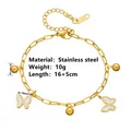 Gedetailleerd overzicht van gouden vlinderarmband met materiaal- en maatspecificaties - Armband (N505) / Vlinder Goud Armband