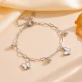 Detailweergave van zilveren roestvrijstalen vlinderarmband met metalen kralen - Armband (M501) / Vlinder Staal Armband