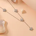 Elegant silver stainless steel chain necklace featuring white daisy flower charms - Daisy Tassel Drop Necklace / Steel