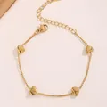 Detailed close-up of a minimalist gold heart necklace made of durable titanium steel - 手链B108 / Gold