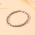 Gedetailleerde close-up van de fijne bamboeknooptextuur op een zilveren stalen armband - Vintage Bamboe Stijl (S508) / Staalkleur