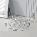 Elegante porta spugne trucco in acrilico trasparente a 9 scomparti, dimensioni 16,3 x 3,5 cm - Trasparente