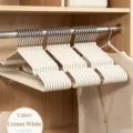 Creamy white non-slip stainless steel clothes hanger for trace-free hanging - Cream White