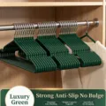 Non-slip stainless steel clothes hangers in light luxury green color. - Luxury Green