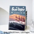 Minimalist A5 spiral notebook featuring scenic mountain cover and sun light typography - Bright Yellow