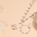 Gepolijste zilveren stalen kogel sieradenset inclusief ketting, armband en oorringen - Kraal Sieradenset / Staalkleur