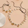 Natural cowrie shell necklace and bracelet set with gold fish, turtle and dolphin charms - Clownfish Jewelry Set (Necklace & Bracelet) / Black