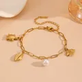 Stainless steel ocean charm pearl bracelet detail, summer beach gold metal jewelry design. - Clownfish & Turtle Beach Bracelets
