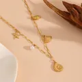 Detailed shot of gold stainless steel ocean beach theme necklace with starfish and pearl charms. - Conch Beach Necklaces