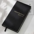 Elegant black leather hardcover planner with gold foil lettering and ribbon bookmark - Black (Self-discipline)