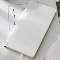 Elegant white hardcover leather journal notebook planner with silver stamped text - White (Live up to youth)