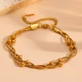 Close-up detail shot of the elegant multi-strand gold snake chain bracelet with shiny small beads. - Bracelet / Gold