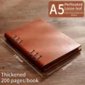 Cuaderno A5 de hojas sueltas en cuero marrón oscuro, 230x160mm con 200 páginas. - A5 / Estilo de Hojas Sueltas Caladas / 230mm x 160mm / Marrón Oscuro