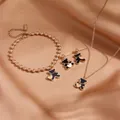 Vergulde roestvrijstalen sieradenset met ketting armband oorbellen en zwarte beer bedeltjes - Zwarte Schelp Roségouden Beer Sieradenset