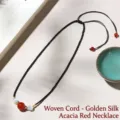 Handcrafted black woven rope necklace featuring a red agate bead with gold accents. - Braided Necklace Gold Thread (Red Beads) / Single Necklace