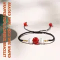 Handcrafted black braided rope bracelet with red agate and white cat's eye beads - Braided Cord Gold Wrapped (Three Beads) Bracelet / Single Bracelet
