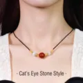 Handmade black cord necklace featuring a red agate bead and two cat's eye stone accents - Regular Transfer Bead Gold Thread Necklace / Single Necklace