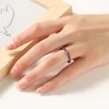 Close-up of a 2mm purple beaded ring with a gold accent on a model's hand - Amethyst Round Bead