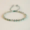 Close-up view of natural moss agate beads and gold spacers on green woven bracelet - 4mm Bead - Multi Gold Beads / Summer Moss Green with Multi Gold Beads