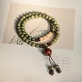 Ethnic style green sandalwood prayer beads bracelet with lotus seeds and tassel. - Verawood Buddhist Beads (6mm)