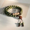 Handcrafted natural green sandalwood Buddhist prayer bead bracelet with Baixiangzi seed accents - Verawood Buddhist Beads (8mm)
