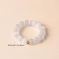 Elegant natural 4mm white cat's eye stone beaded ring with a small gold bead accent - 4mm Round Bead / White Cat's Eye Ring